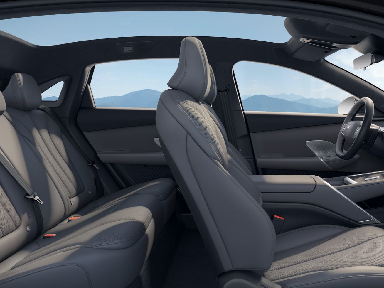 The rear cabin of an XPENG MONA M03 under its panoramic glass roof