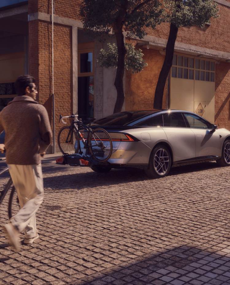 A LimoX car moving through the business district